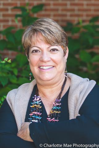 Portrait of  Kathy Dow-Burger, M.A., CCC-SLP